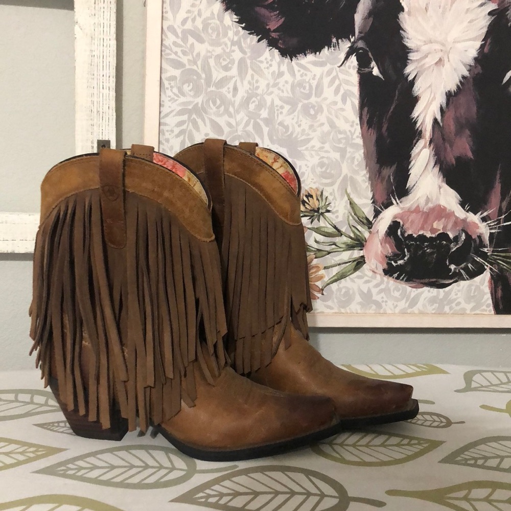 Ariat fringe boots.